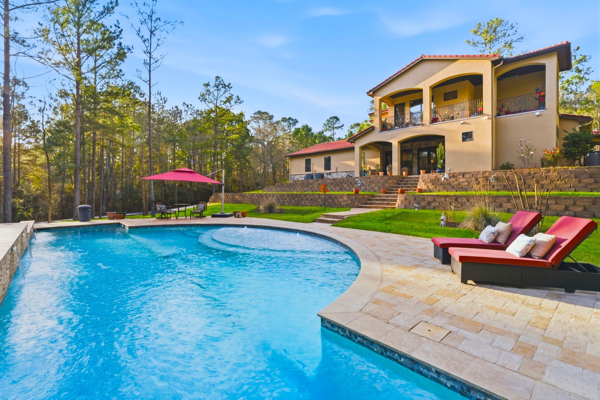 280 Sundog Road Huntsville, TX 77340 - Photo 43 of 50 a front view of house with yard and swimming pool