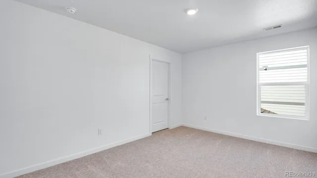 an empty room with a window