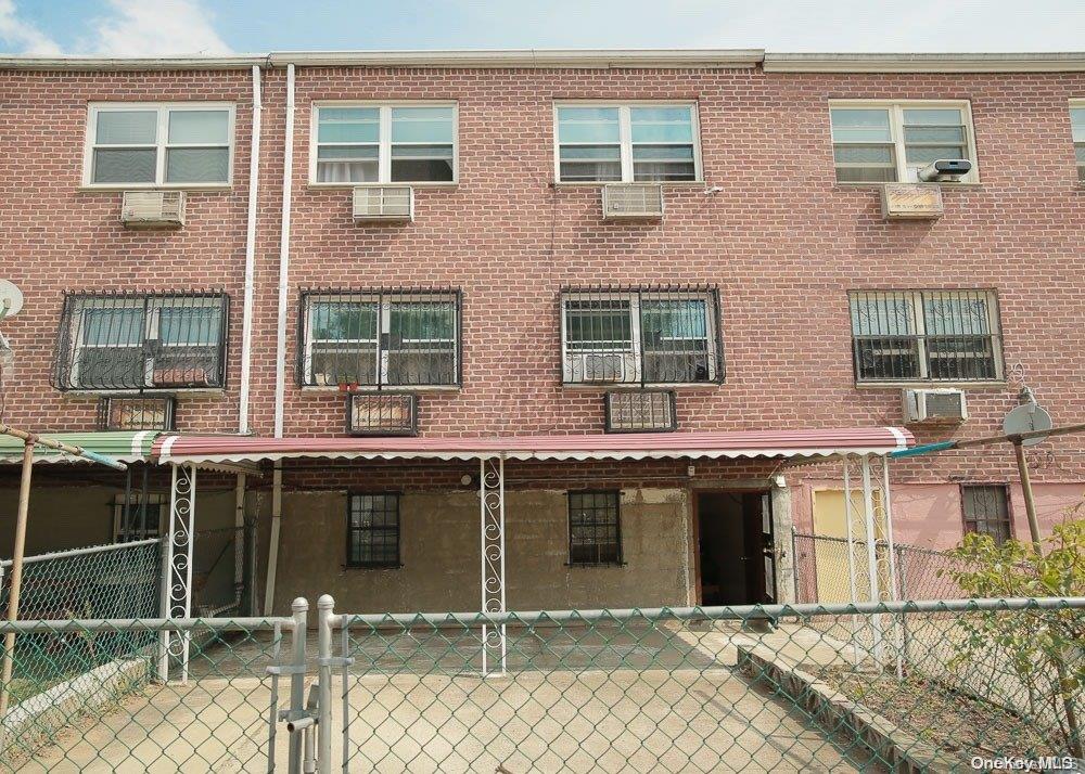 610 Pine Street Brooklyn, NY 11208 - Photo 19 of 35 a view of a house with many windows