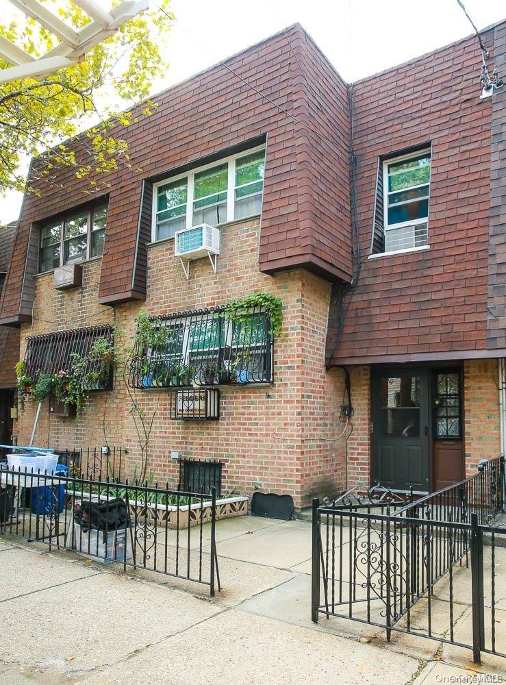 610 Pine Street Brooklyn, NY 11208 - Photo 26 of 35 a front view of a house with a porch