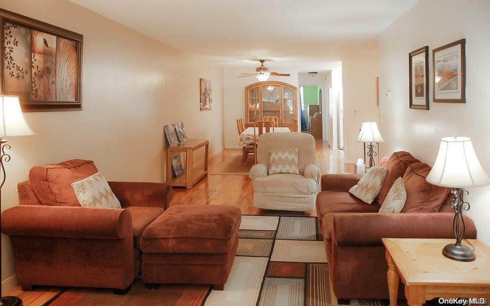 610 Pine Street Brooklyn, NY 11208 - Photo 28 of 35 a living room with furniture and a lamp