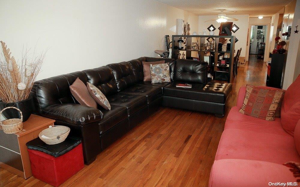 610 Pine Street Brooklyn, NY 11208 - Photo 34 of 35 a living room with furniture and wooden floor