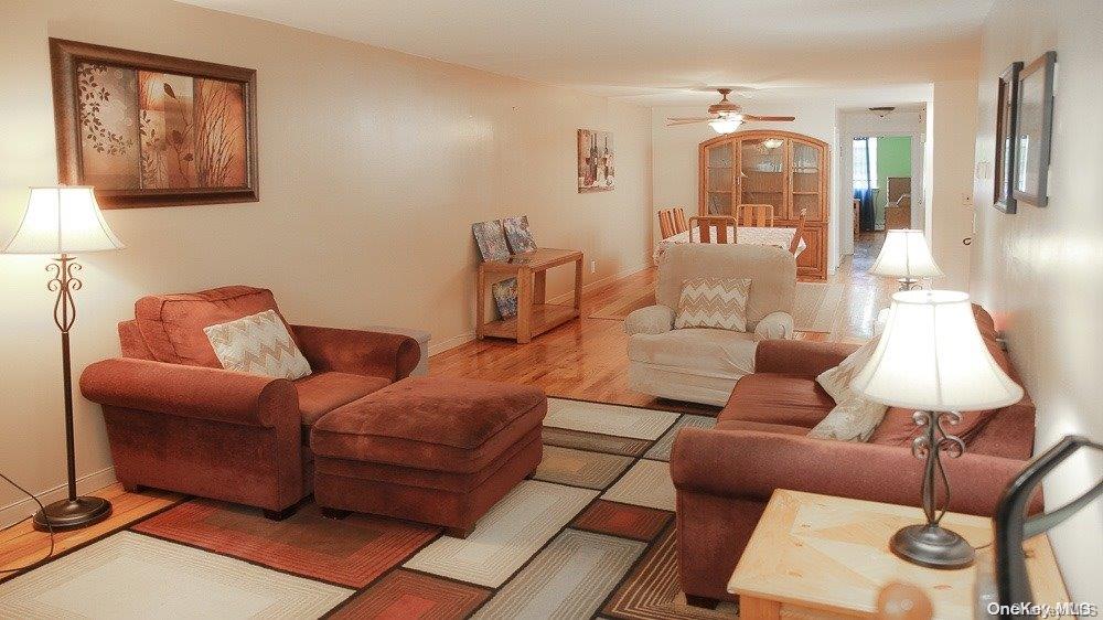 610 Pine Street Brooklyn, NY 11208 - Photo 3 of 35 a living room with furniture and wooden floor
