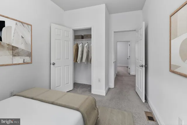 a bathroom with a sink a toilet and shower curtain