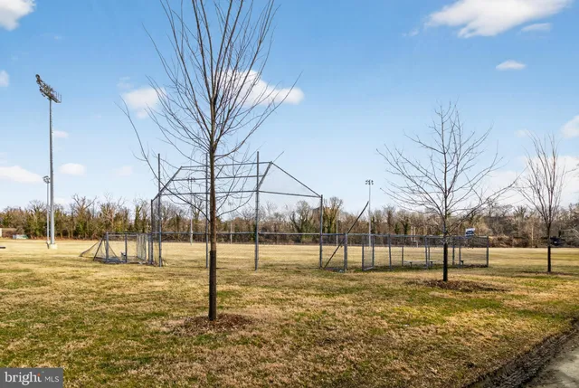 a view of swimming pool with a yard