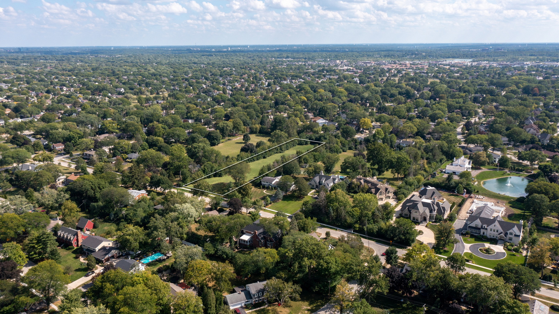 110 East Farnham Lane Wheaton, IL 60189 - Photo 2 of 17 an aerial view of multiple house with yard and outdoor seating