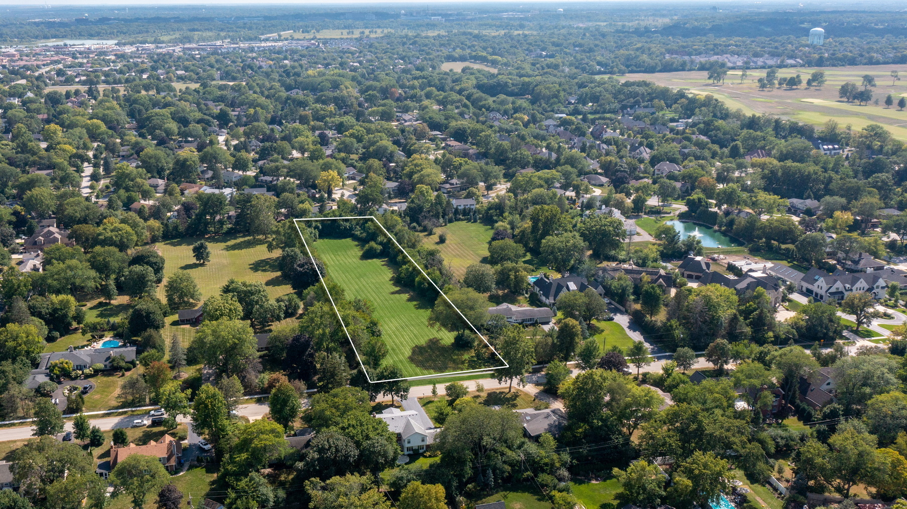 110 East Farnham Lane Wheaton, IL 60189 - Photo 3 of 17 an aerial view of residential houses with outdoor space and trees