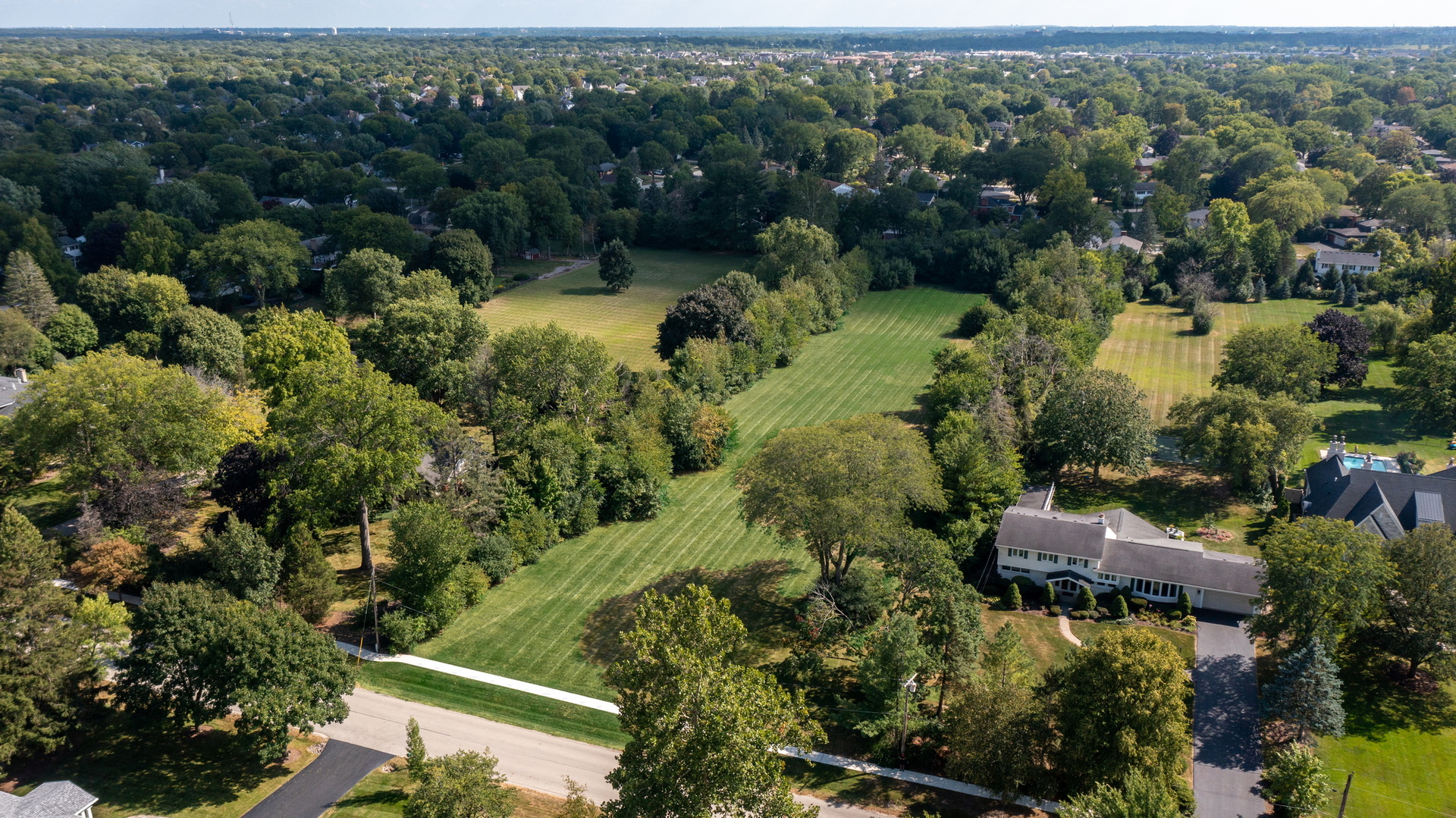 110 East Farnham Lane Wheaton, IL 60189 - Photo 9 of 17 an aerial view of residential house with outdoor space and trees all around