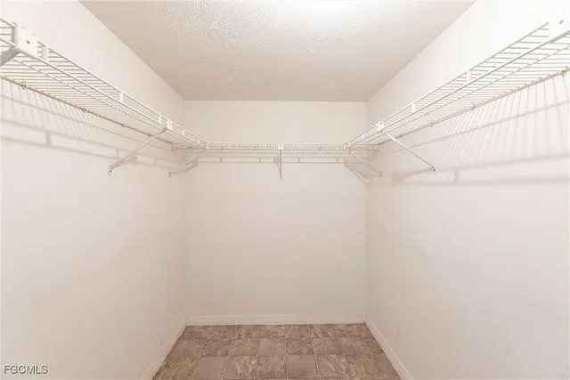 a view of a room with racks on the wall