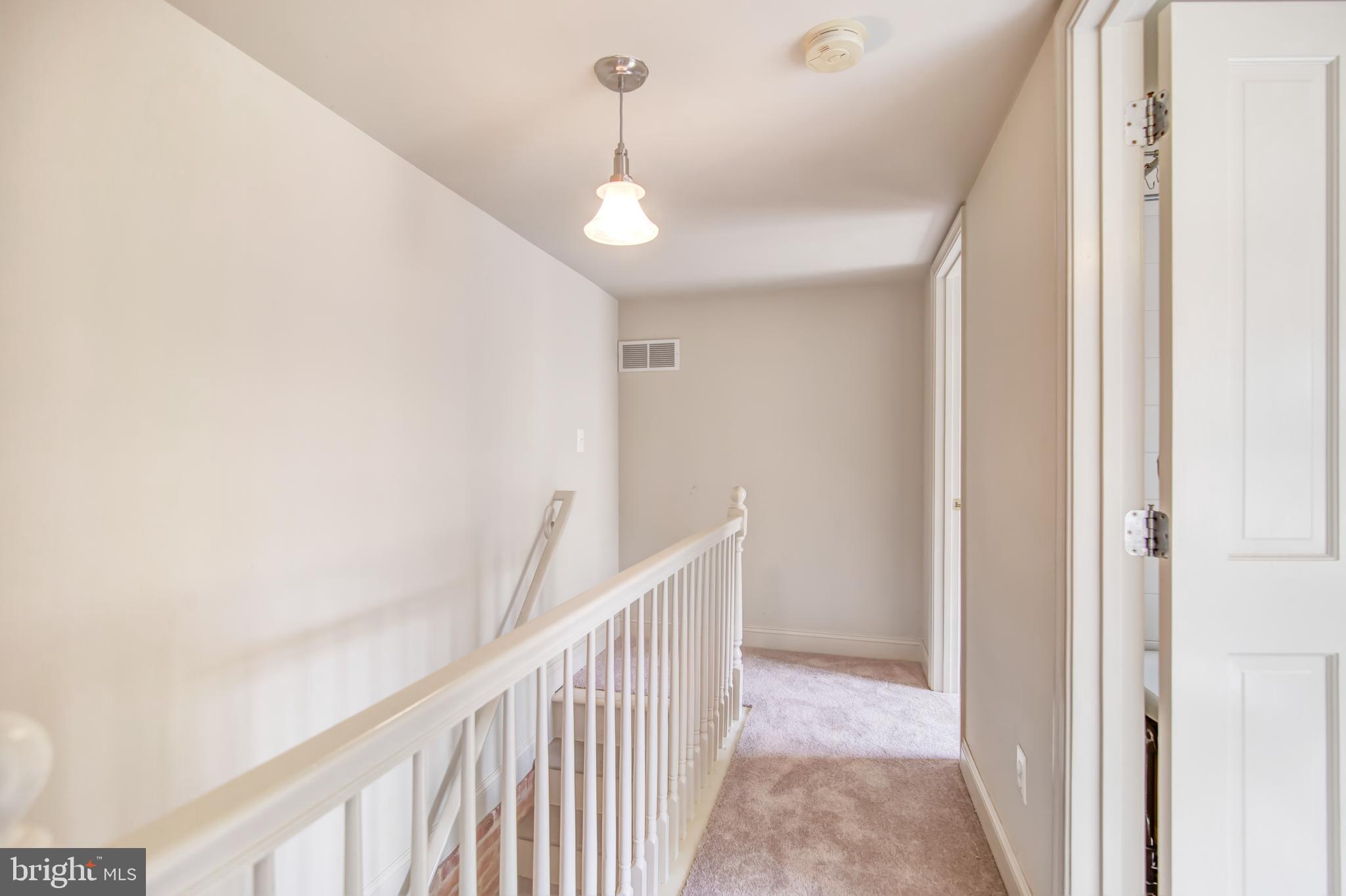 19 South Bentz Street Frederick, MD 21701 - Photo 14 of 44 2nd floor hall- new carpet on 2nd foor!
