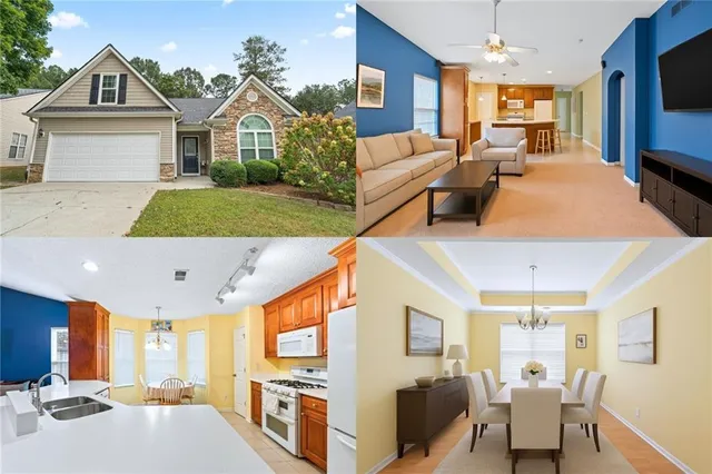 a living room with couches a flat tv screen and kitchen view