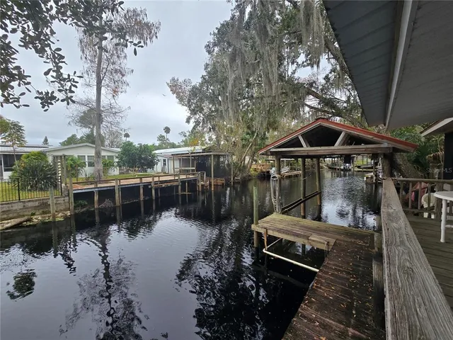 a view of a lake with a patio