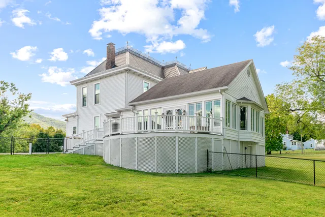a front view of a house with a porch