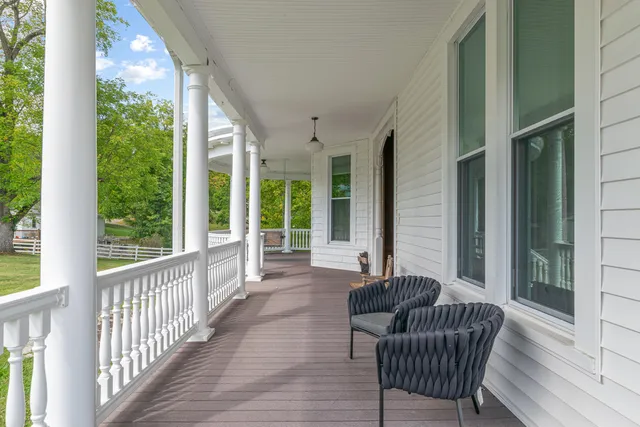 a kitchen with stainless steel appliances granite countertop a stove a sink dishwasher and a microwave oven with cabinets