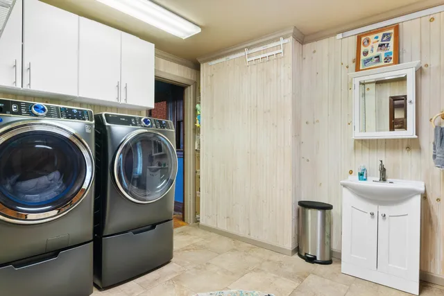 a view of a livingroom with furniture and a window