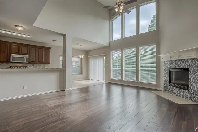 a kitchen with a sink stainless steel appliances and cabinets