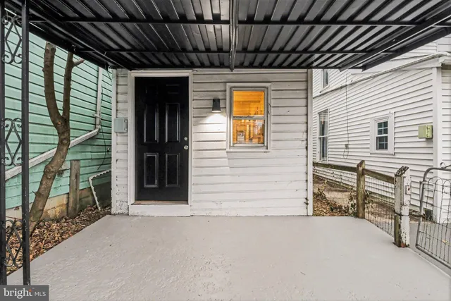 a view of backyard with cabin