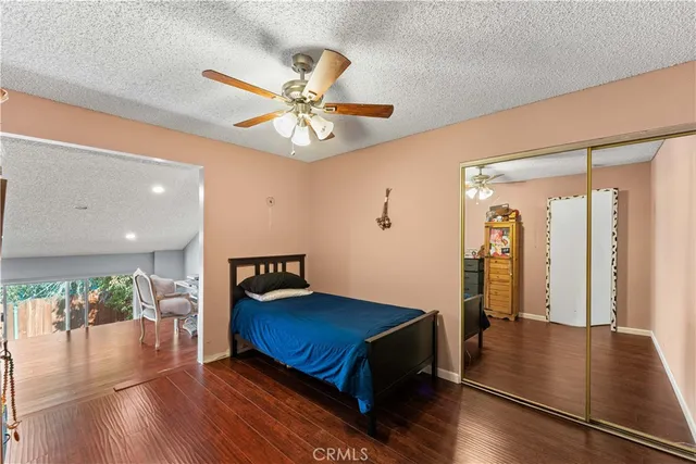 a view of a livingroom with furniture and wooden floor