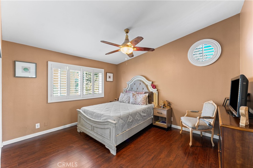 12331 Carl Street Pacoima, CA 91331 - Photo 18 of 28 a bedroom with a bed and a window