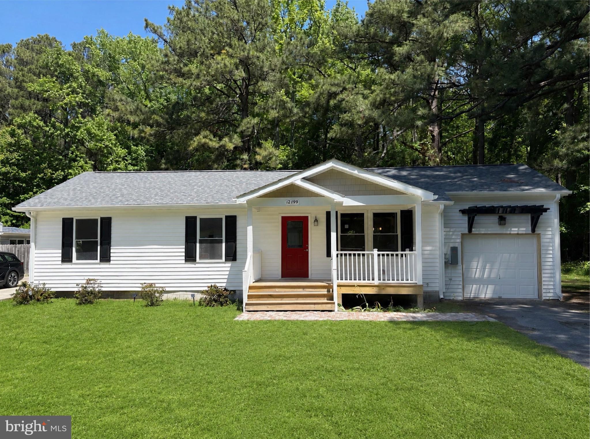 12199 Tower Way Exmore, VA 23350 - Photo 1 of 6 Charming home with vibrant red door.