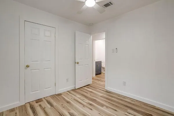 a view of a room that has a window in it