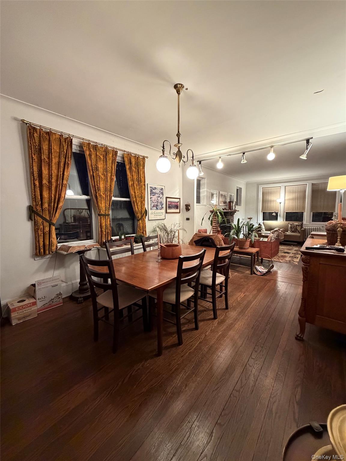 6004 Netherland Avenue Bronx, NY 10471 - Photo 13 of 30 a view of a dining room with furniture window and wooden floor