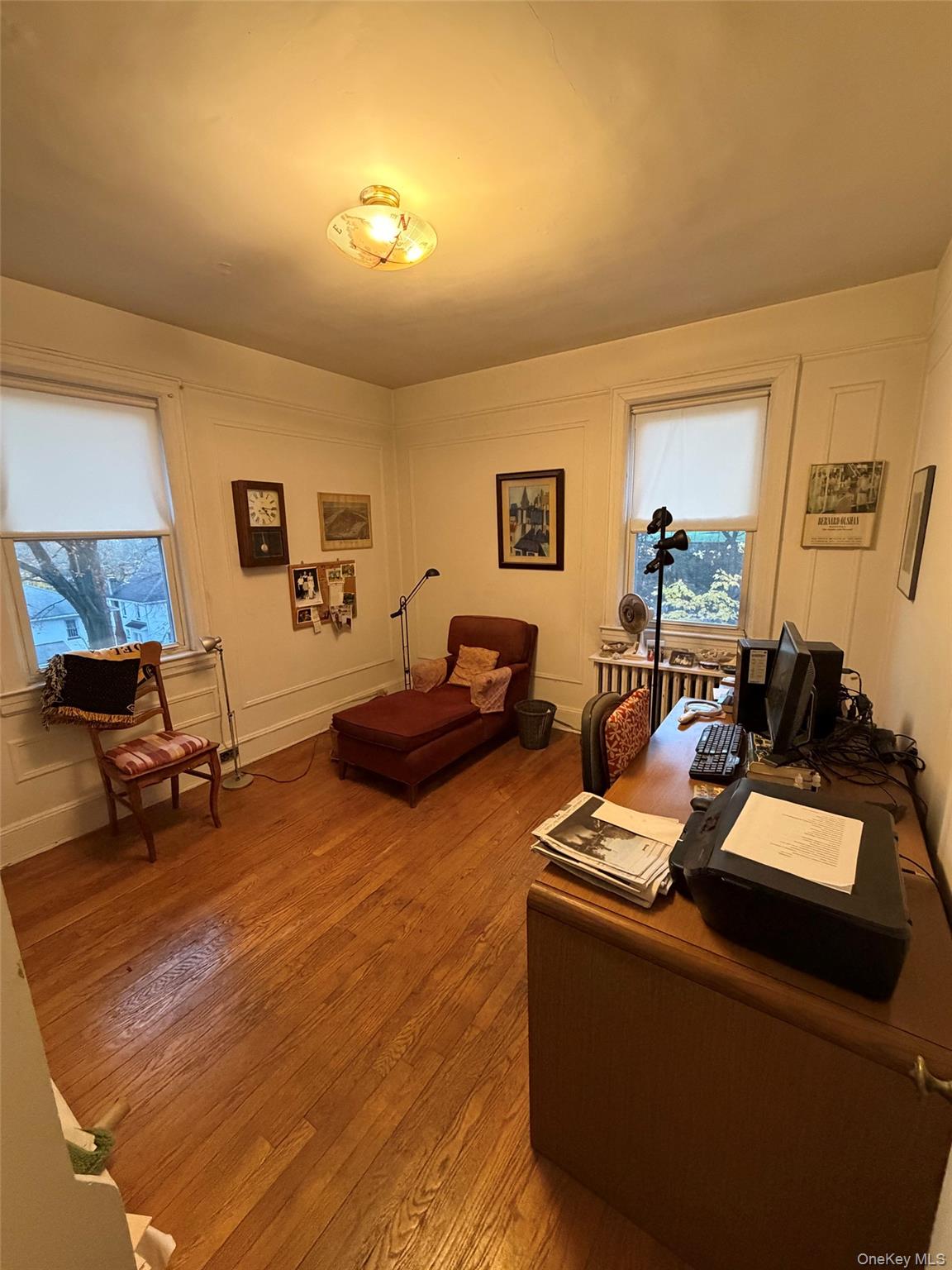 6004 Netherland Avenue Bronx, NY 10471 - Photo 19 of 30 a living room with furniture and a wooden floor