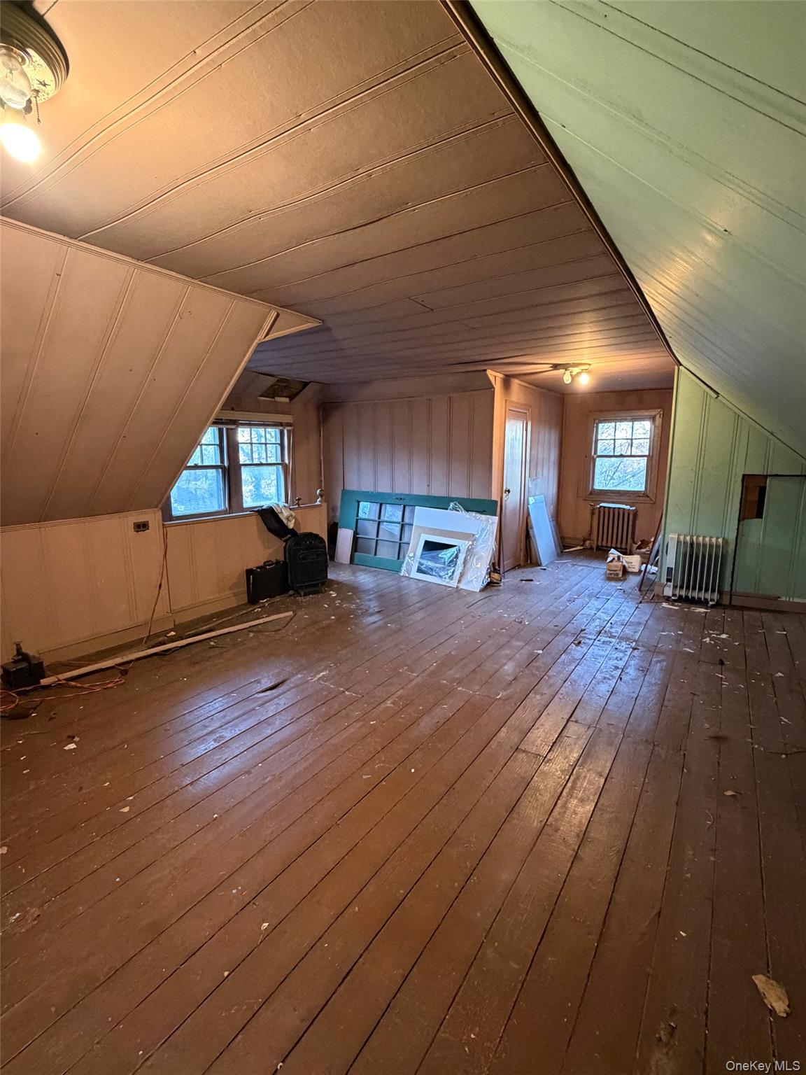 6004 Netherland Avenue Bronx, NY 10471 - Photo 24 of 30 a view of a room with wooden floor