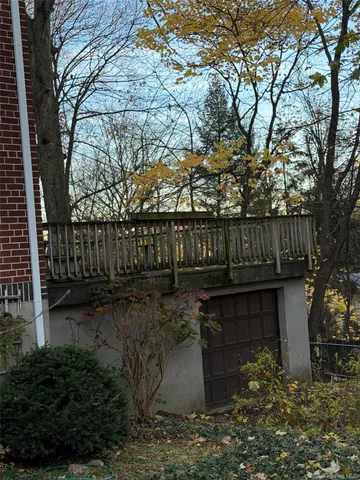 a view of street with wooden fence