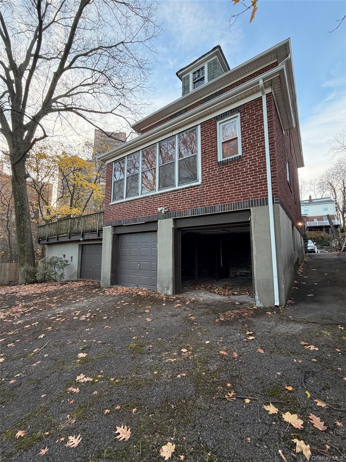 6004 Netherland Avenue Bronx, NY 10471 - Photo 4 of 30 a front view of a house with yard