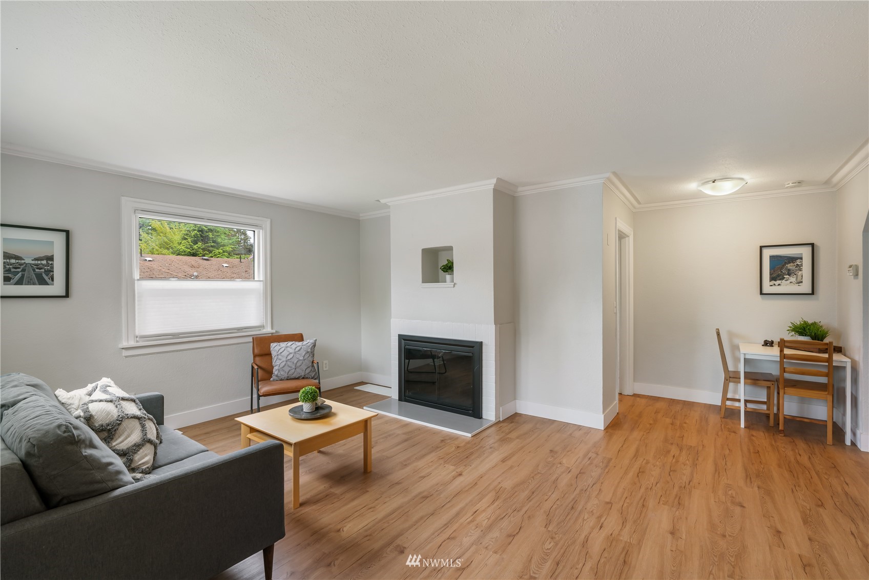 307 South Cabot Road Everett, WA 98203 - Photo 4 of 26 a living room with furniture and a fireplace