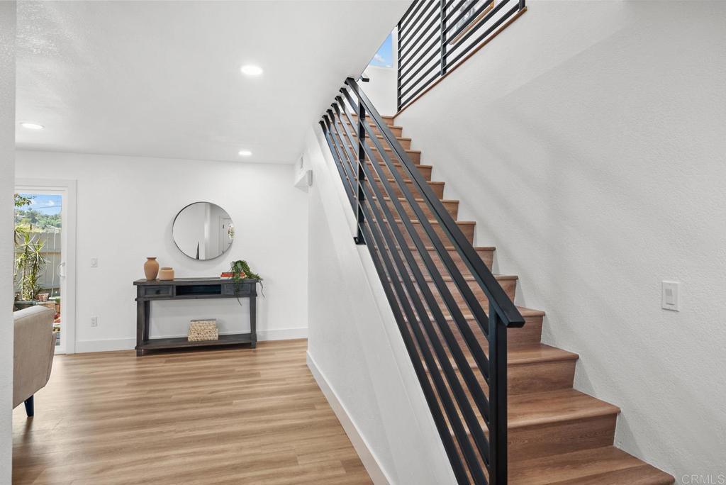 9306 Hollyhock Lane Spring Valley, CA 91977 - Photo 15 of 61 a view of entryway and hall with wooden floor