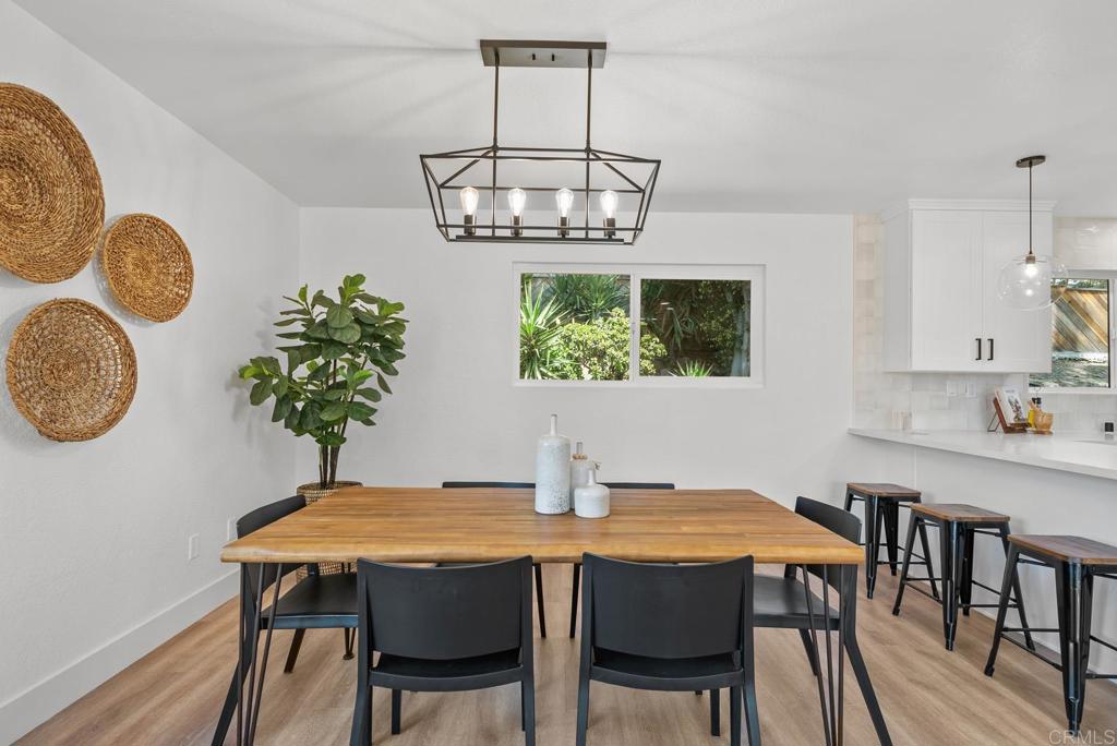 9306 Hollyhock Lane Spring Valley, CA 91977 - Photo 25 of 61 a dining room with furniture and window