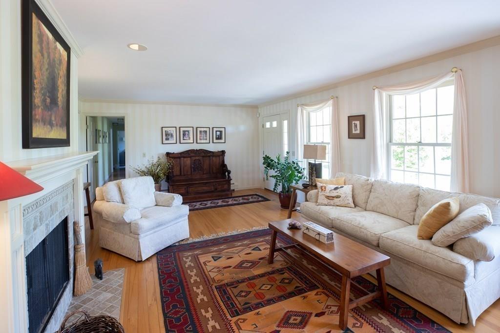 411 West Leyden Road Leyden, MA 01337 - Photo 12 of 42 a living room with furniture and a fireplace