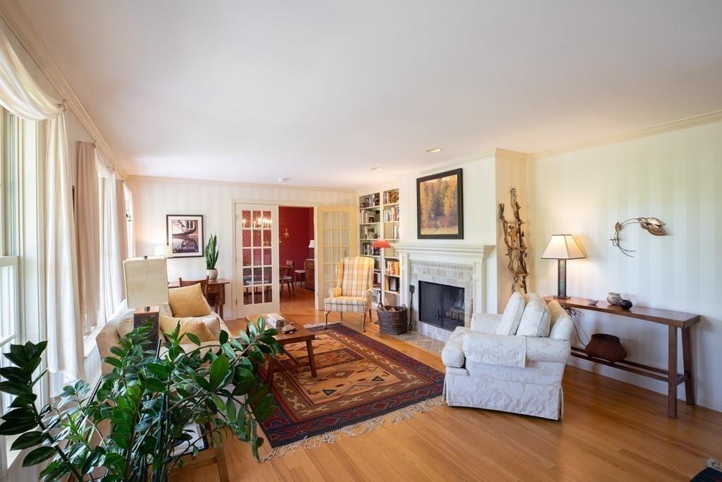 411 West Leyden Road Leyden, MA 01337 - Photo 13 of 42 a living room with furniture large window and fireplace