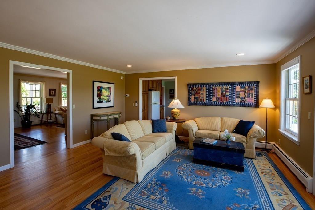 411 West Leyden Road Leyden, MA 01337 - Photo 15 of 42 a living room with furniture and a gate