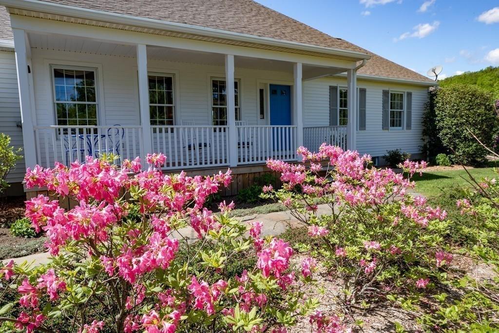 411 West Leyden Road Leyden, MA 01337 - Photo 35 of 42 a pink flowers in front of the house