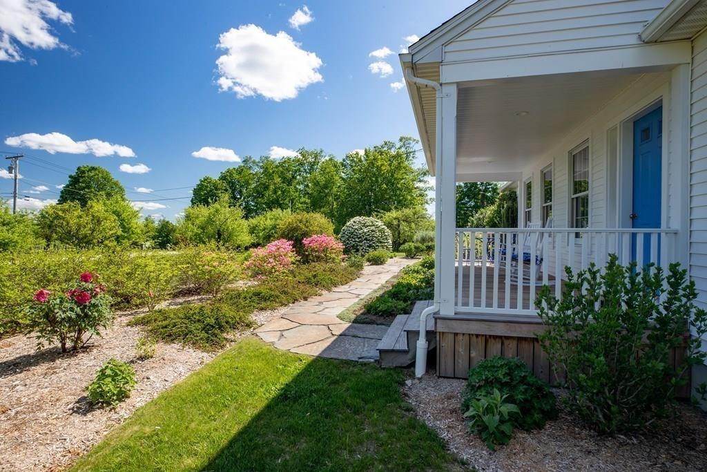411 West Leyden Road Leyden, MA 01337 - Photo 39 of 42 a front view of a house with a yard