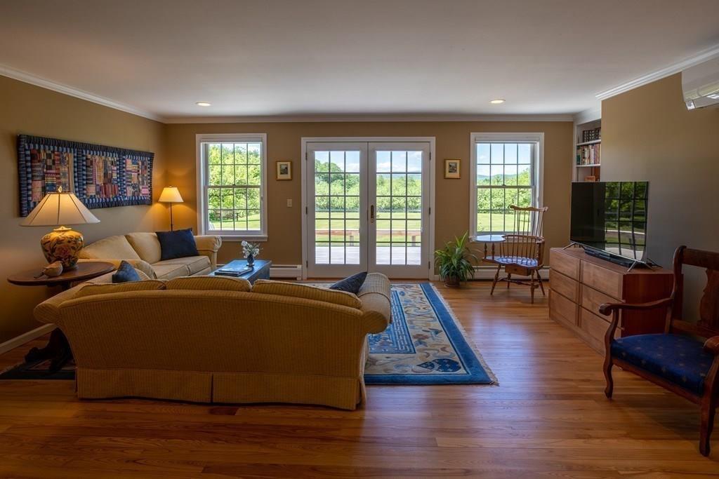 411 West Leyden Road Leyden, MA 01337 - Photo 10 of 42 a living room with furniture and a large window