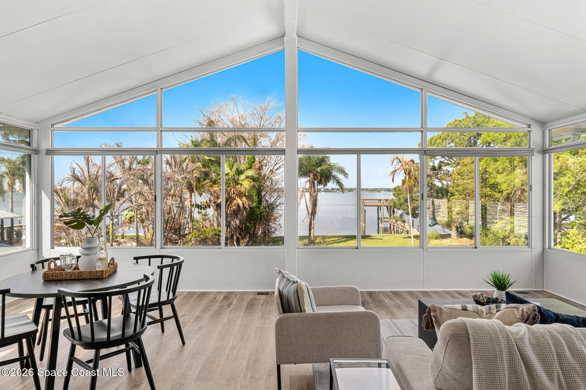 975 Oak Street Merritt Island, FL 32953 - Photo 21 of 76 a view of a dining room with furniture window and outside view