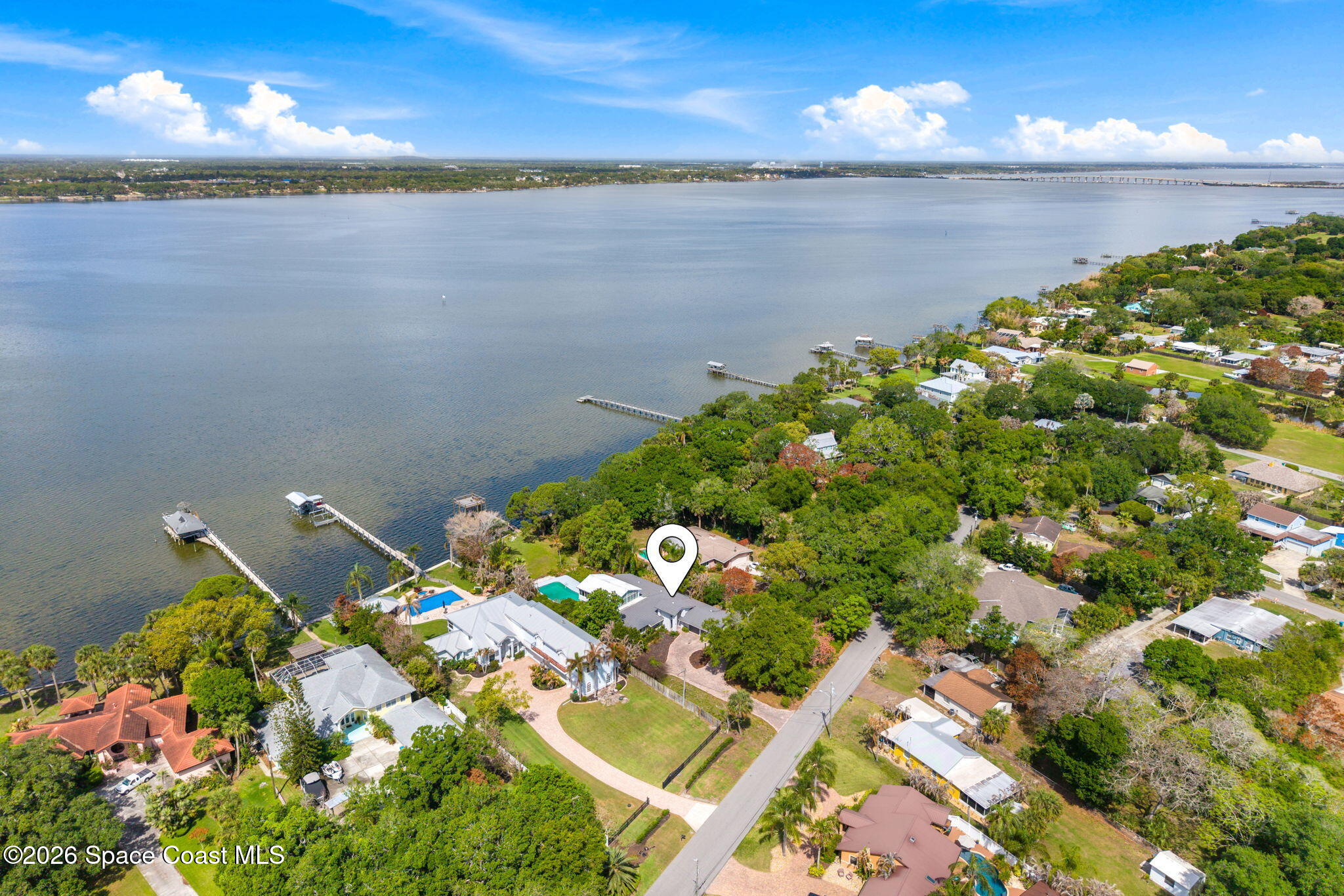 975 Oak Street Merritt Island, FL 32953 - Photo 70 of 76 a view of a lake with a lake