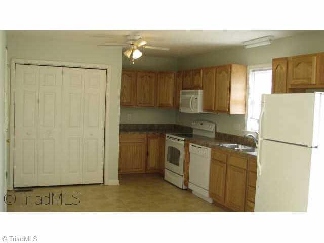 5529 Jason Road Greensboro, NC 27405 - Photo 2 of 6 Other. Brand New Cabinets, Tops, Sink, Faucet, Range & Microwave.