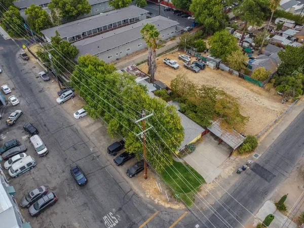 an aerial view of a backyard of a house
