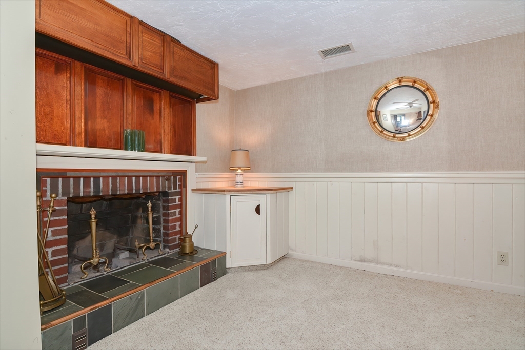 64 Pine Point Road Stow, MA 01775 - Photo 30 of 35 a view of livingroom with fireplace