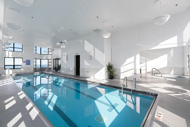 a view of a living room and dining room