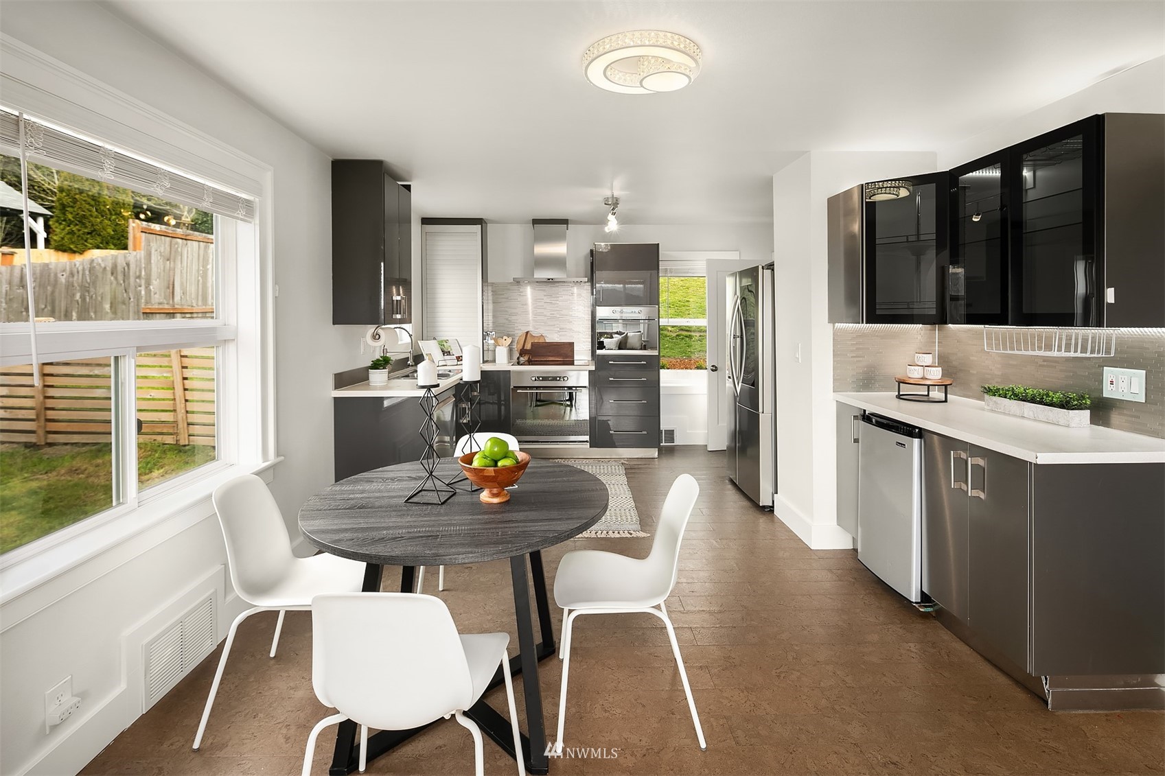 806 Cedar Avenue South Renton, WA 98057 - Photo 5 of 20 a kitchen with a table and chairs