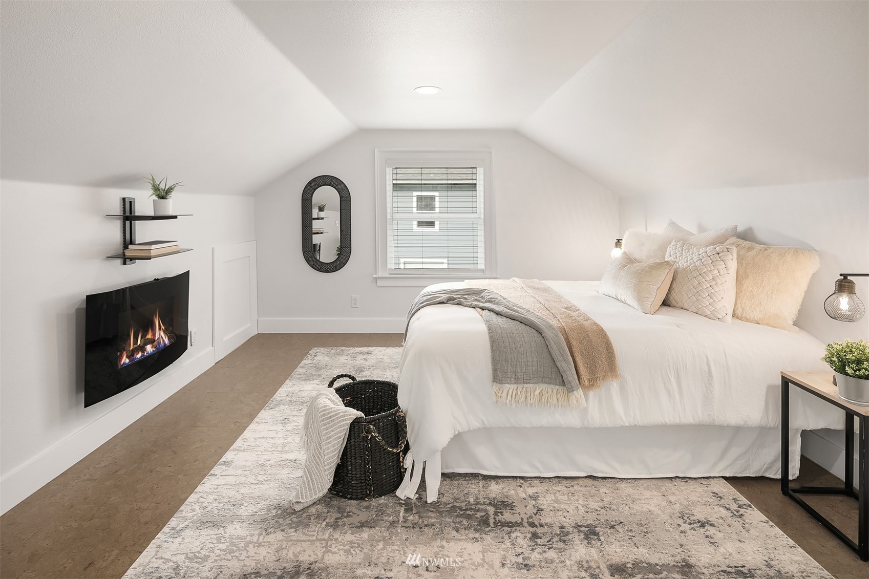 806 Cedar Avenue South Renton, WA 98057 - Photo 10 of 20 a bedroom with a bed and a fireplace