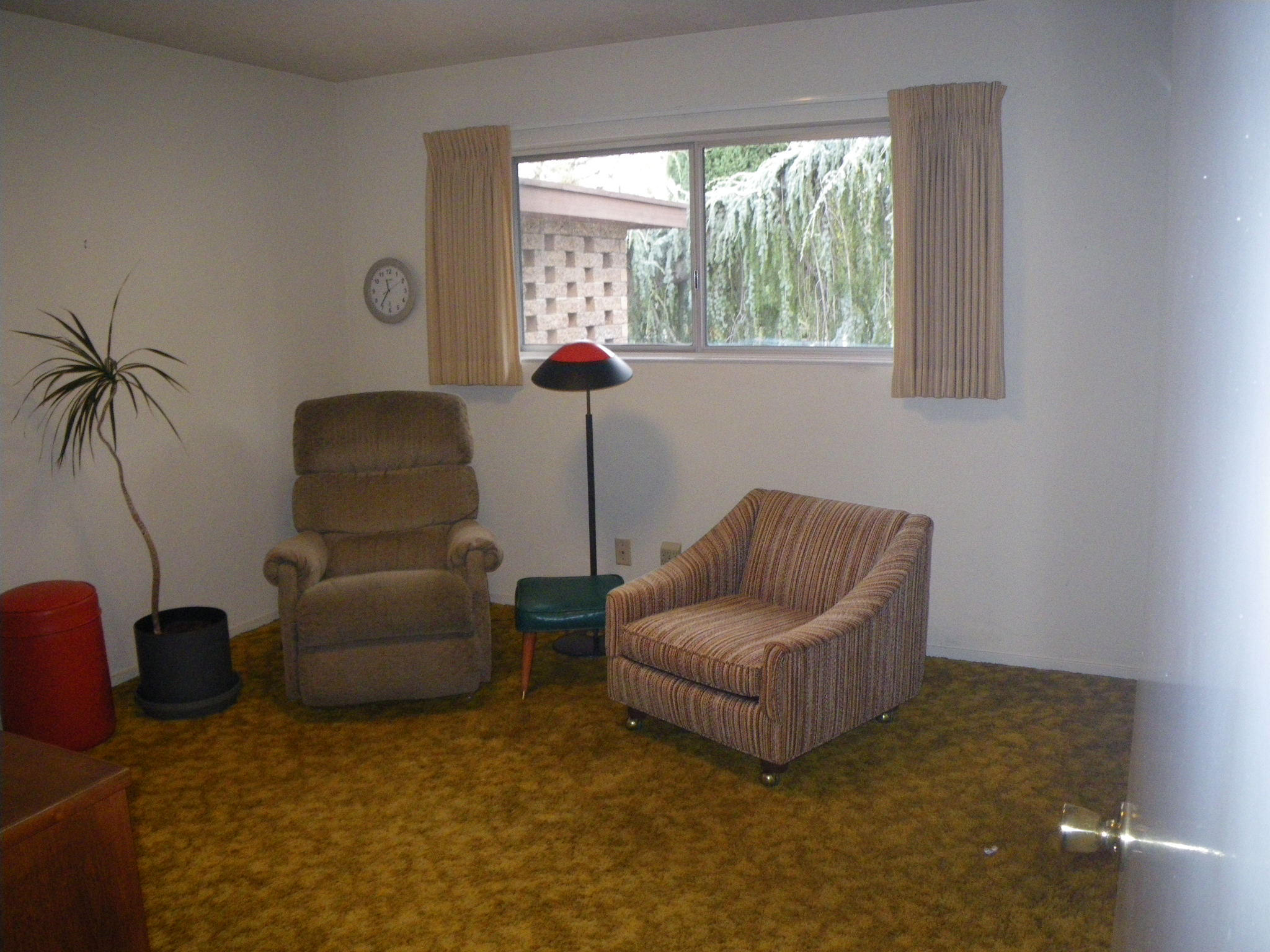 8815 Valley View Road Redding, CA 96001 - Photo 11 of 25 a living room with furniture and a window