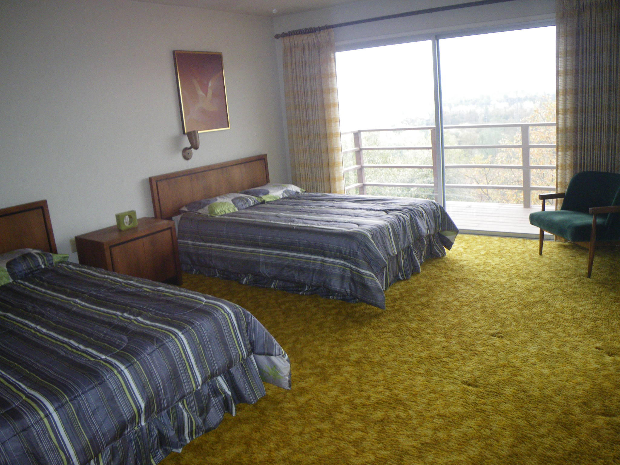 8815 Valley View Road Redding, CA 96001 - Photo 10 of 25 a bedroom with bed and a window