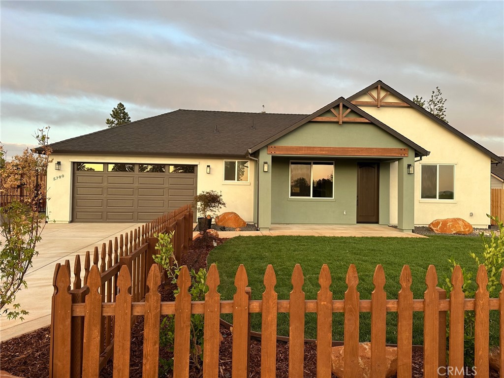 5780 Copeland Road Paradise, CA 95969 - Photo 1 of 1 a front view of a house with a garden